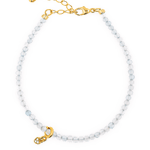 Health Aquamarine dainty bracelet featuring a heart charm, promoting peace and emotional healing.