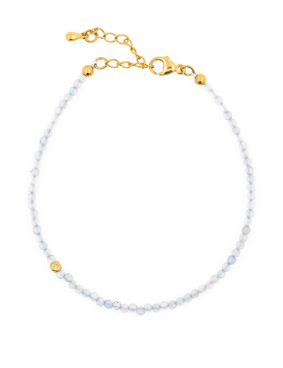 Health aquamarine faceted bracelet with silver spacer beads showcasing tranquility and elegance.