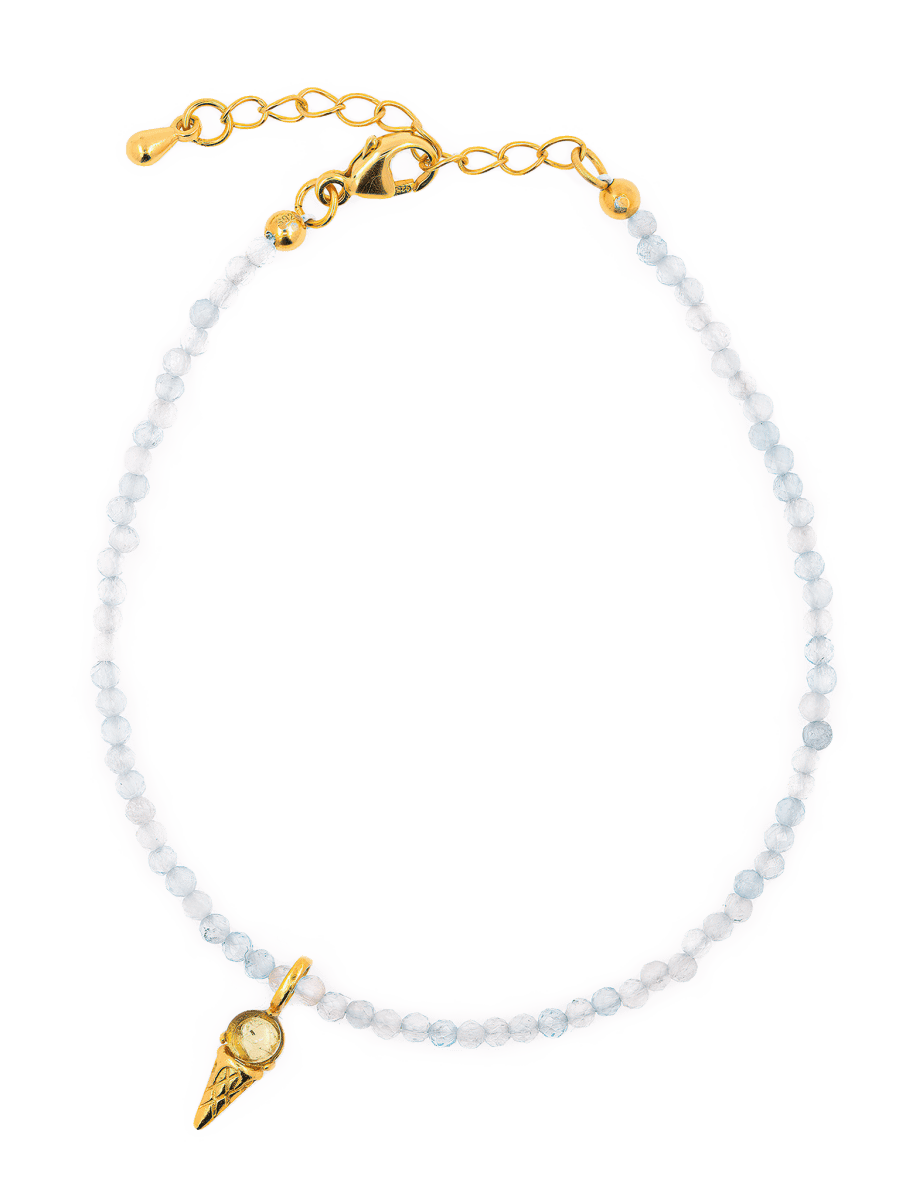 Aquamarine faceted dainty bracelet with gold ice cream charm for tranquility and emotional healing.