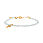 Health Aquamarine faceted bracelet with gold clasp and ice cream charm, symbolizing tranquility and joy.
