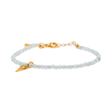 Health Aquamarine faceted bracelet with gold clasp and ice cream charm, symbolizing tranquility and joy.