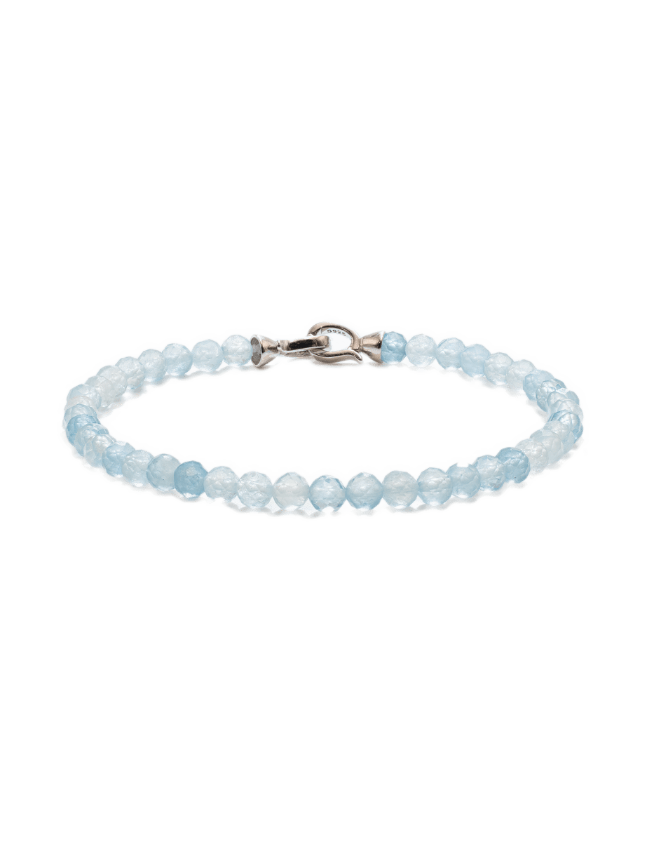 Aquamarine March birthstone bracelet with 4mm faceted beads and sterling silver clasp, promoting tranquility and emotional healing.