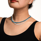 Model showcasing a Health Blue Apatite Dainty Necklace with a 925 sterling silver clasp, emphasizing energy and creativity.