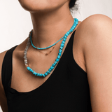 Model wearing a Health Green Turquoise Faceted Dainty Necklace alongside a complementary necklace, showcasing its vibrant hues.