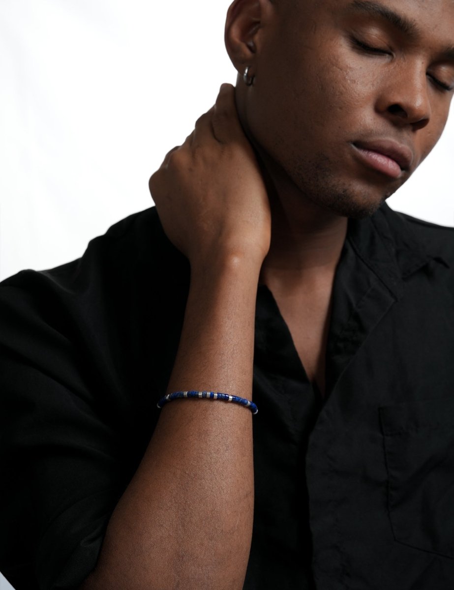 Model wearing BEAMMORE lapis lazuli faceted 4×2mm bracelet – Clean, modern style