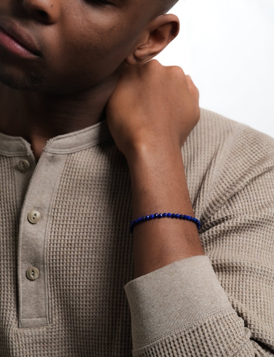 Model wearing BEAMMORE lapis lazuli faceted 4mm bracelet – Clean, modern style