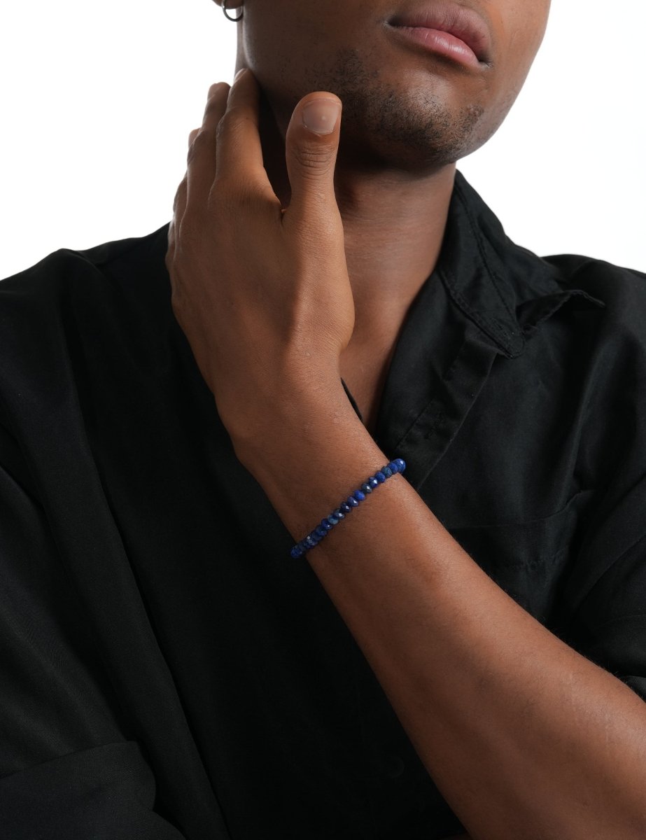Model wearing BEAMMORE lapis lazuli faceted 4×6mm bracelet – Clean, modern style