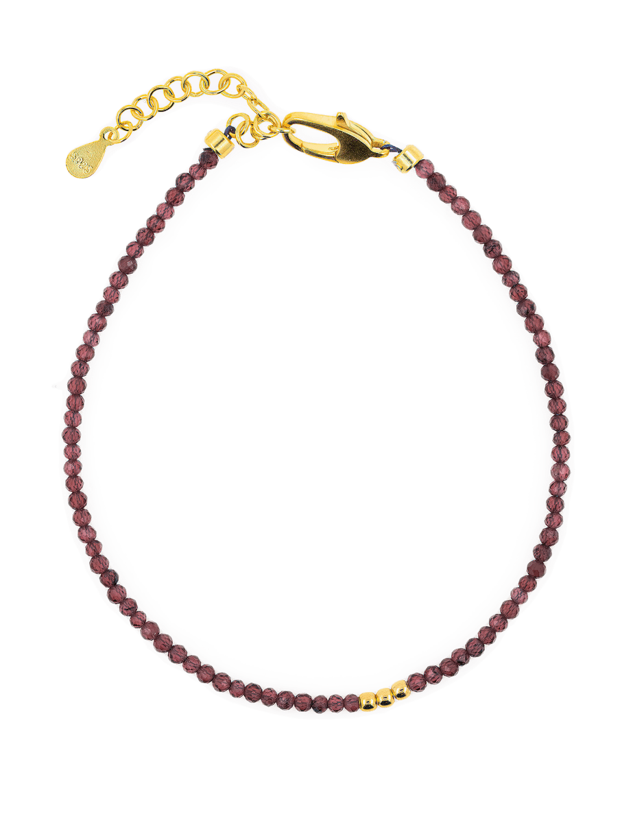 Love Garnet dainty bracelet featuring 2mm garnet beads and silver spacer beads for elegance and durability.