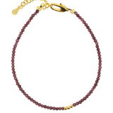 Love Garnet dainty bracelet featuring 2mm garnet beads and silver spacer beads for elegance and durability.