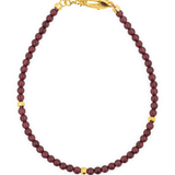 Love Garnet dainty bracelet featuring 3mm silver spacer beads and a gold clasp for elegance and durability.