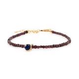 Love Garnet faceted bracelet with lapis lazuli charm in 925 sterling silver, promoting love and emotional healing.