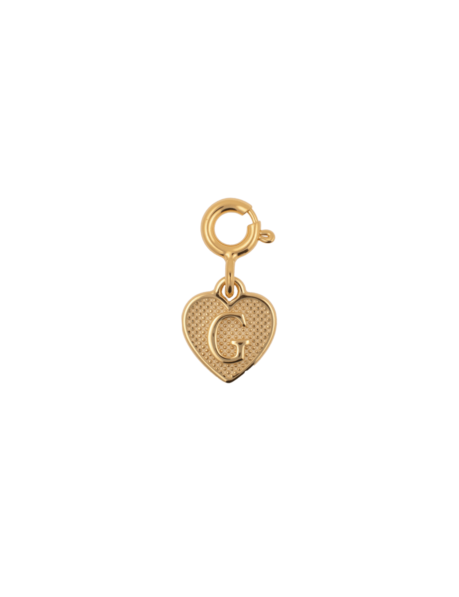 Gold heart charm with engraved letter 'G', symbolizing love and personal connections.