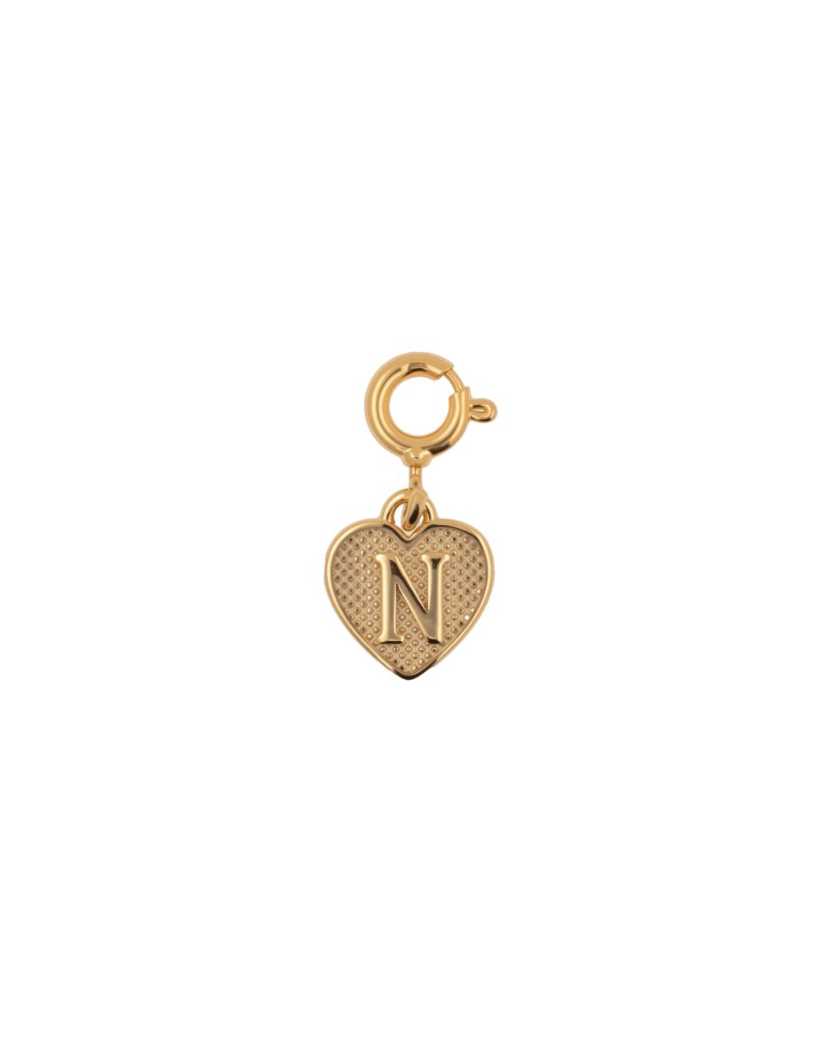 Gold heart charm pendant engraved with the letter N, representing love and personal connections.