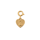 Gold heart pendant charm with initial 'Z', symbolizing love and personal connections.