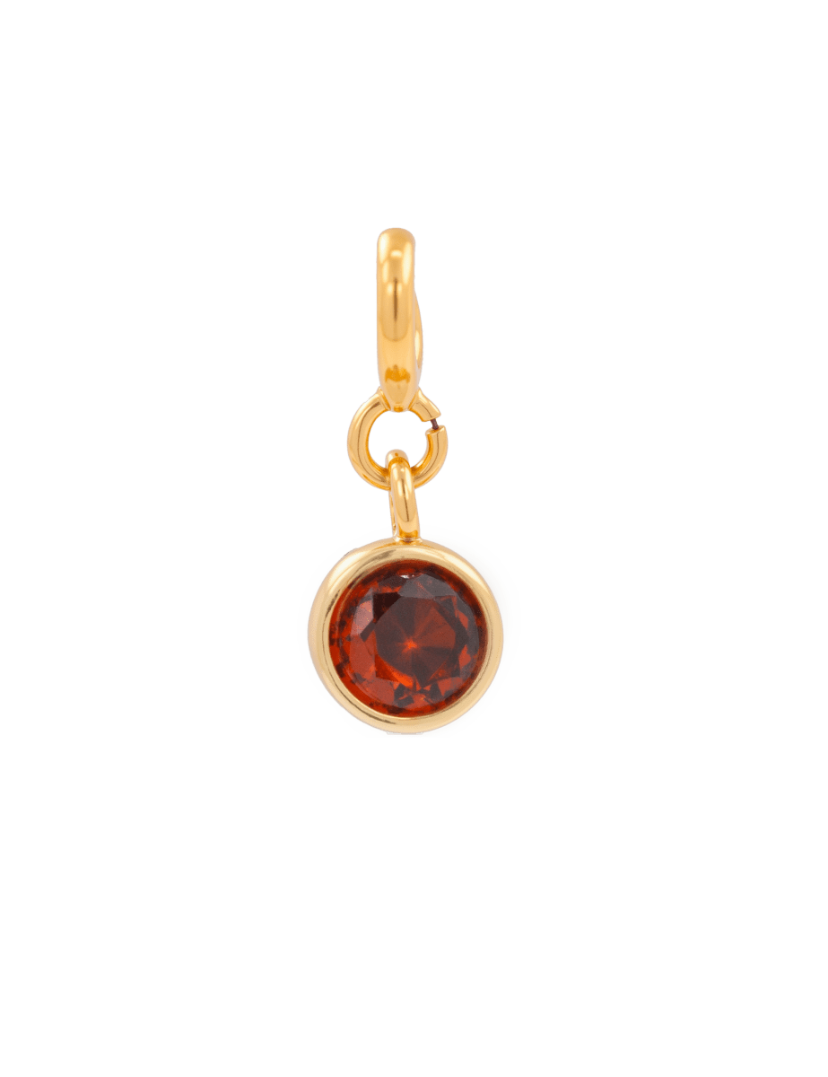 Love Red Zircon Charm pendant featuring a 6mm round garnet-colored zircon in a gold setting, symbolizing ambition and strength.