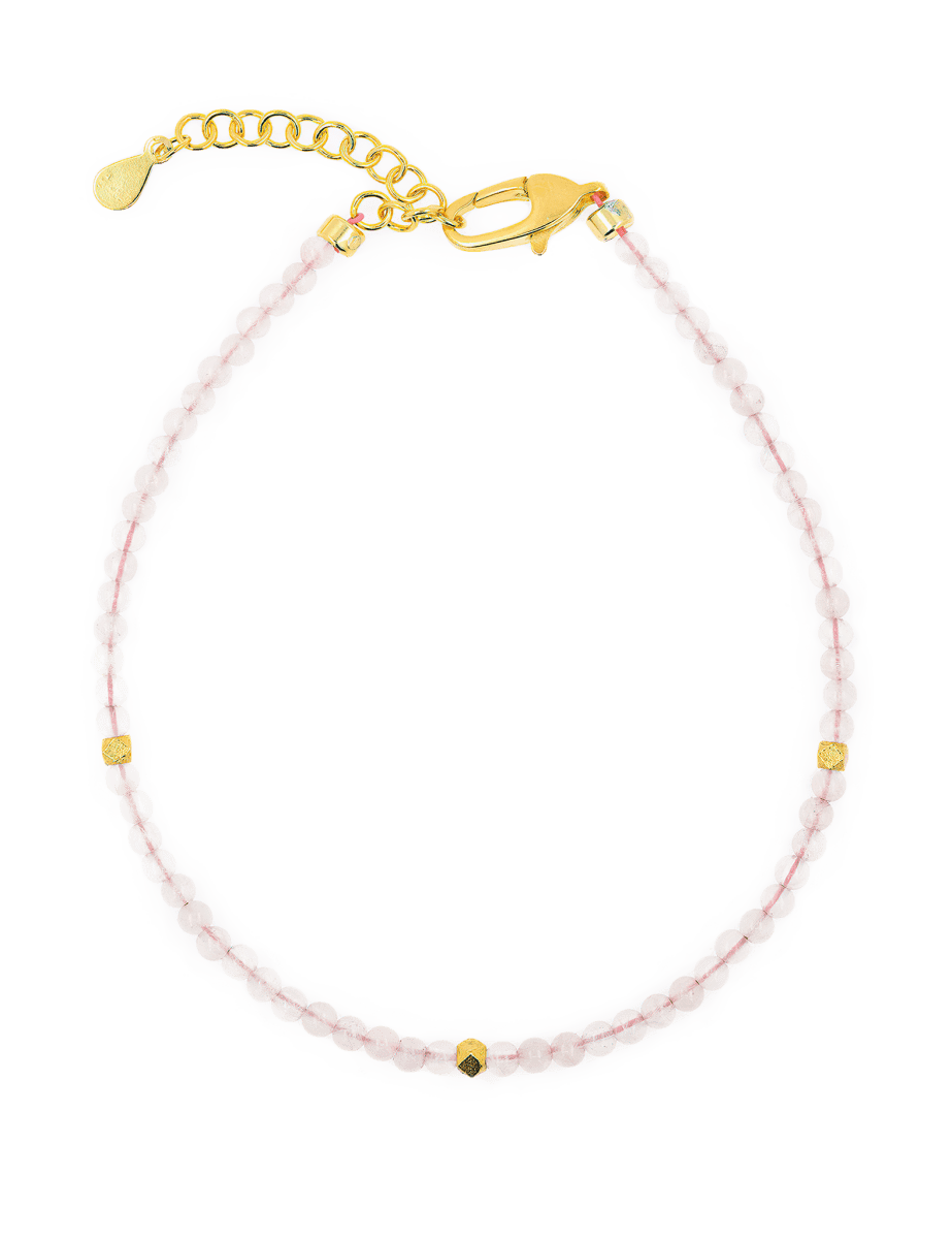 Love Rose Quartz bracelet with silver spacer beads, promoting emotional healing and self-love.