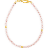 Love Rose Quartz bracelet with gold accents, featuring pink quartz beads and a secure clasp, promoting emotional healing.