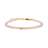 Love Rose Quartz bracelet with silver spacers, promoting self-love and emotional healing.
