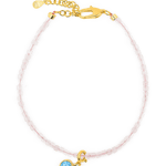 Rose Quartz faceted bracelet with Blue Zircon charm and gold clasp for emotional harmony and self-love.