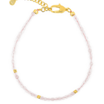 Love Rose Quartz bracelet with silver spacer beads, promoting emotional healing and self-love.