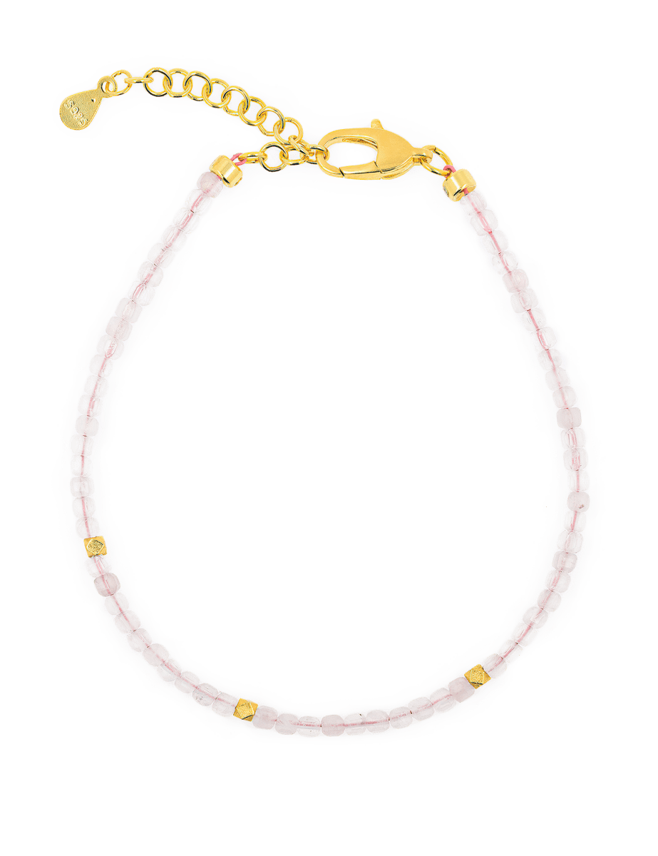 Love Rose Quartz bracelet with silver spacer beads, promoting emotional healing and self-love.