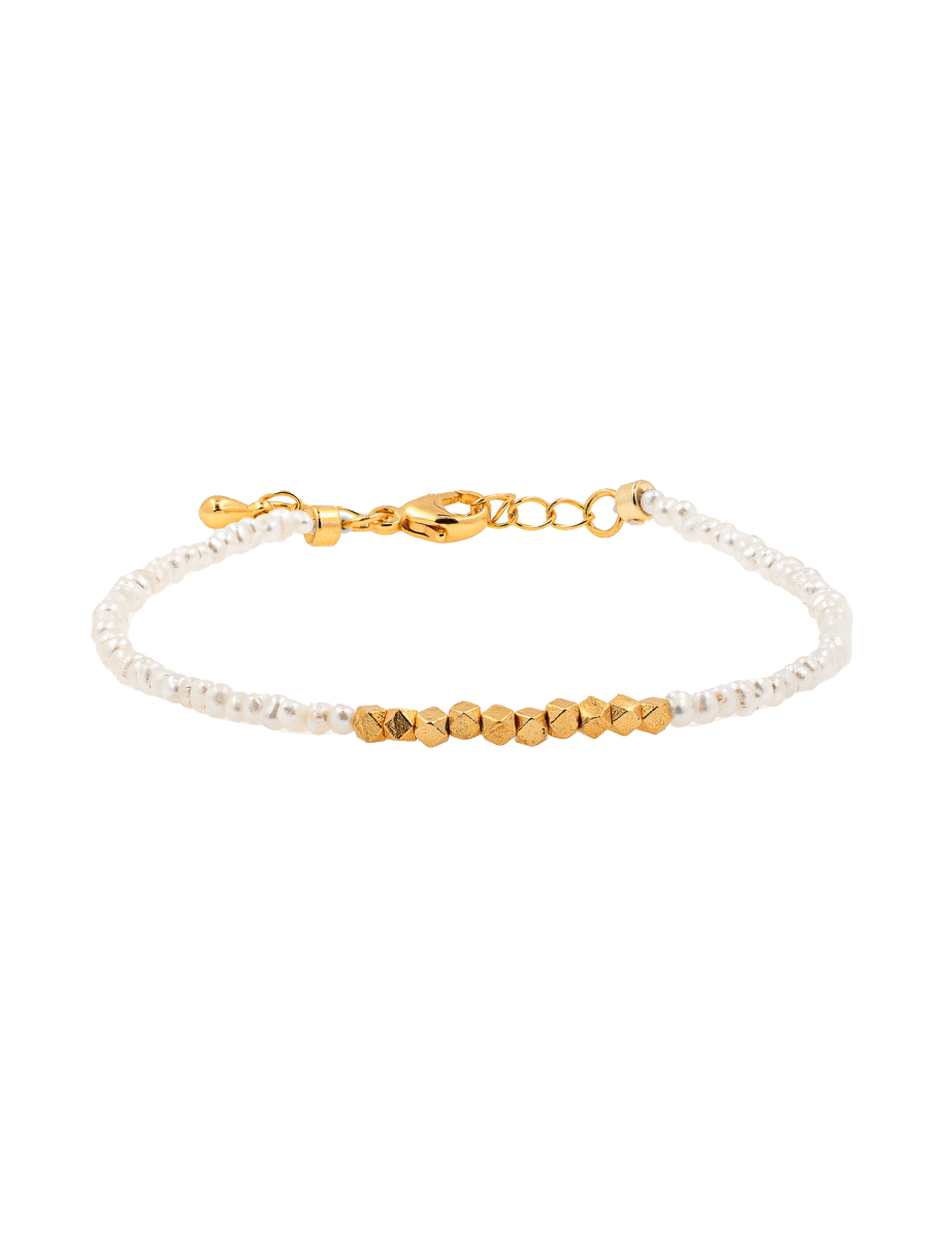Metal Lunar Essence Pearl Dainty Bracelet with silver spacer beads and natural pearls, showcasing elegance and simplicity.