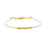 Metal Lunar Essence Pearl Dainty Bracelet with silver spacer beads and natural pearls, showcasing elegance and simplicity.