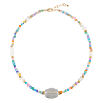 MIRA Rainbow Opal, Blue Topaz, Clear Quartz, and Mother of Pearl beaded necklace with gold accents.