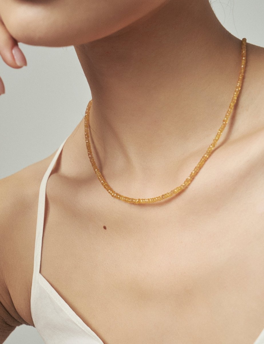 Model wearing BEAMMORE yellow sapphire beaded necklace – Elegant birthstone jewelry gift for women