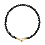 Black Onyx bracelet with 3x4mm faceted beads and a gold clasp, promoting protection and emotional balance.