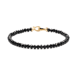 Black Onyx bracelet with 3x4mm faceted beads and sterling silver clasp for protection and emotional balance.