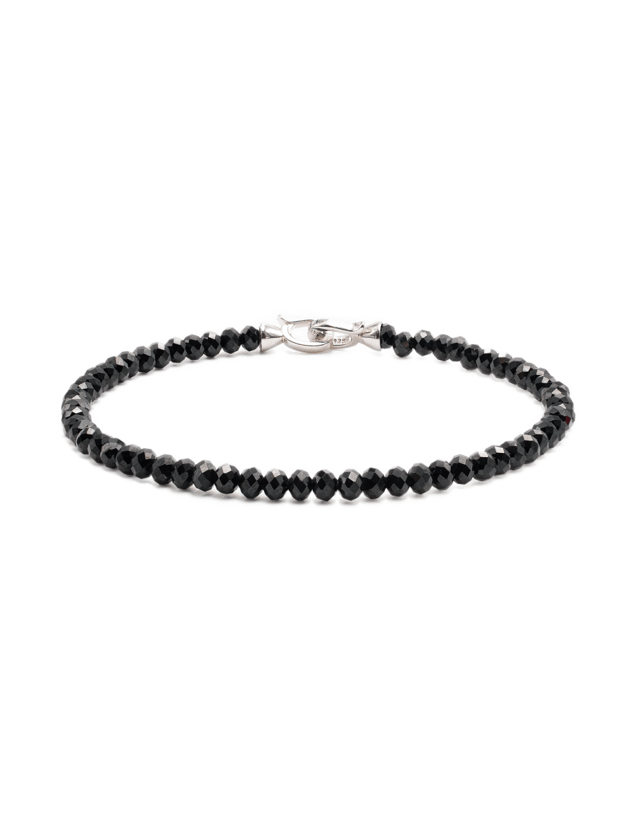 Black Onyx bracelet featuring 3x4mm faceted beads and a sterling silver clasp for protection and emotional balance.