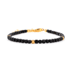Black Tourmaline faceted bracelet with silver spacer beads for protection and emotional stability.