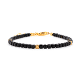 Black Tourmaline faceted bracelet with silver spacer beads for protection and emotional stability.