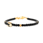 Black Tourmaline faceted bracelet with silver spacer bead and moon charm for protection and emotional balance.