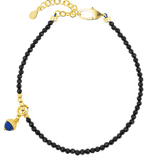 Black Tourmaline bracelet with silver spacer and Lapis Lazuli charm, elegant protective jewelry piece.