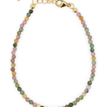 Tourmaline dainty bracelet with gold clasp and spacer beads for protection and positivity.
