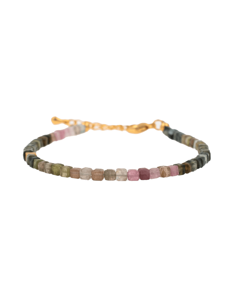 Dainty Tourmaline faceted bracelet with silver spacer bead, designed for protection and emotional stability.