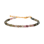 Dainty Tourmaline faceted bracelet with silver spacer bead, designed for protection and emotional stability.