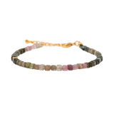 Dainty Tourmaline faceted bracelet with silver spacer bead, designed for protection and emotional stability.