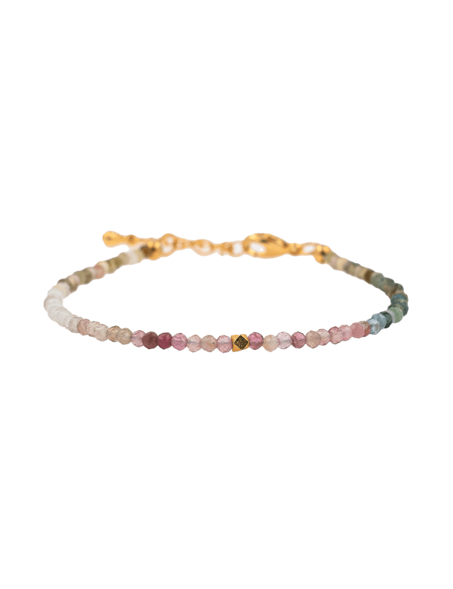 Dainty Tourmaline bracelet with gold clasp, featuring faceted beads for protection and emotional stability.