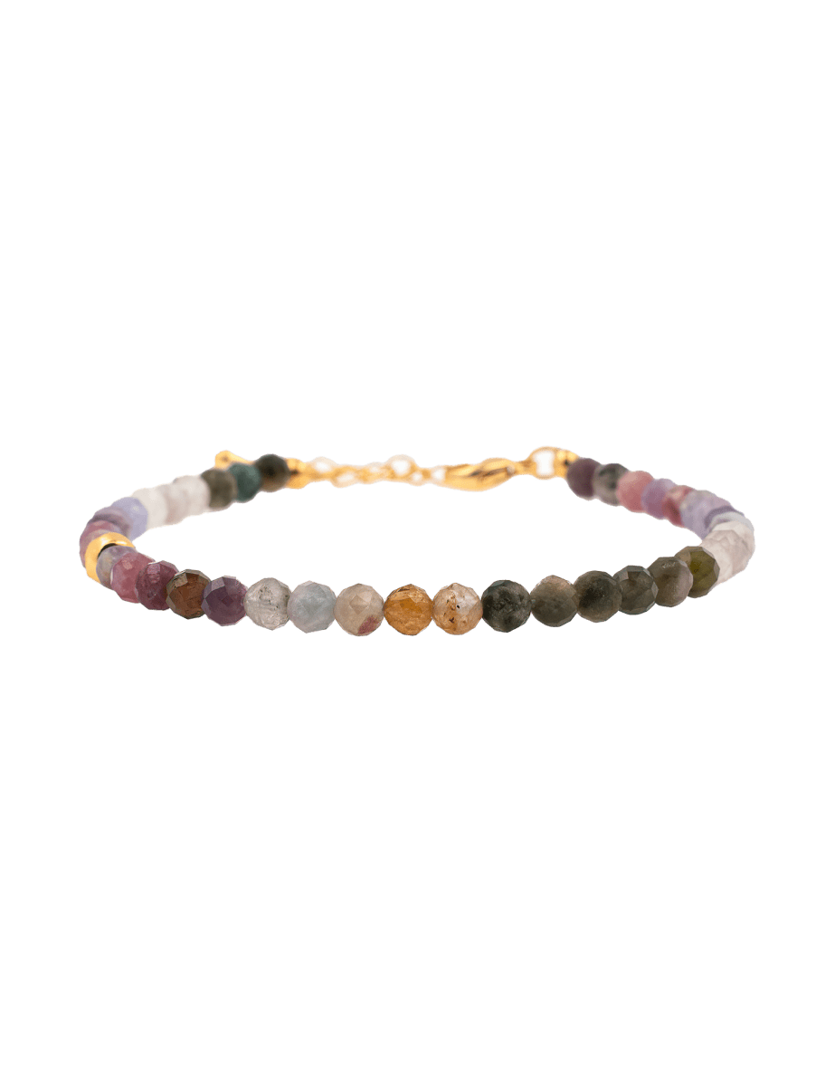Dainty Tourmaline bracelet with silver spacer beads, known for energy protection and positive vibrations.