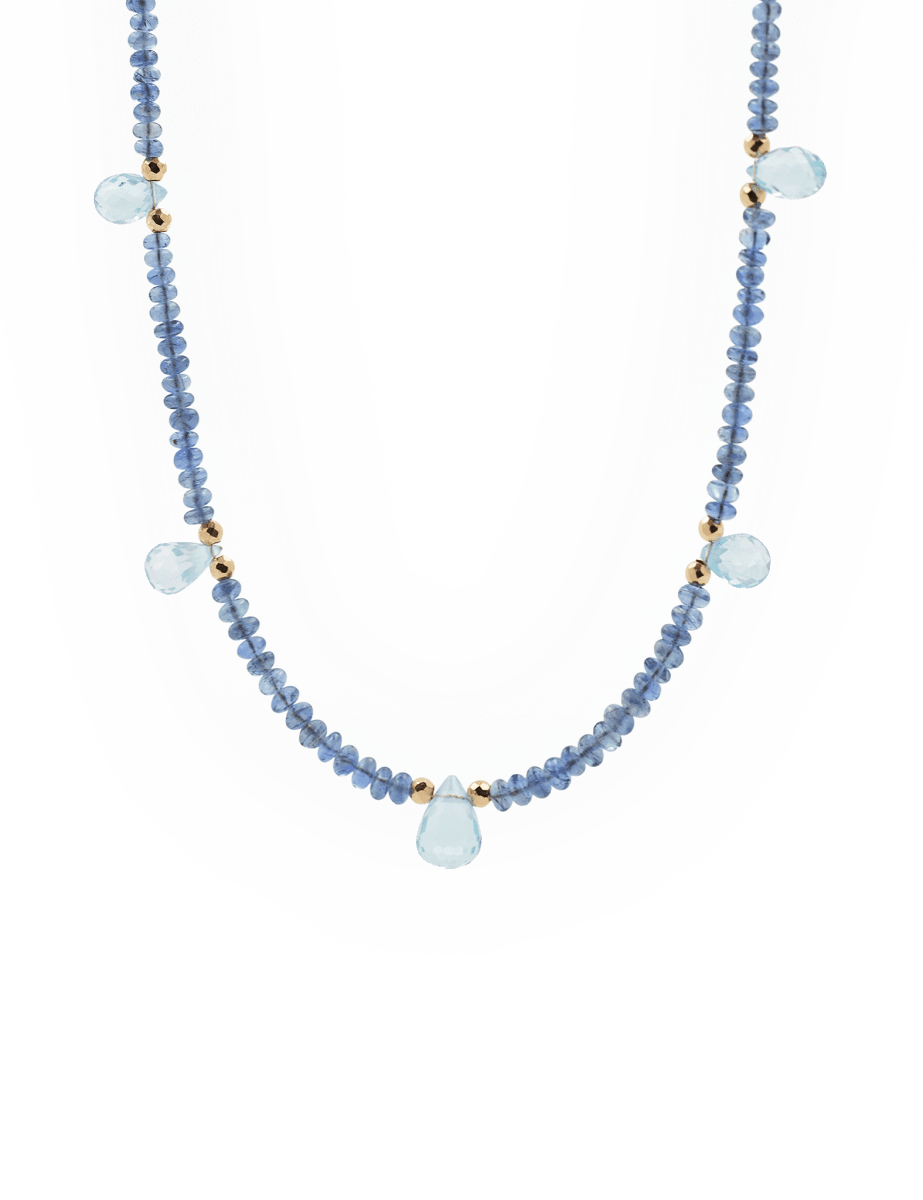 Light sapphire and blue topaz drop pendant necklace in 18K gold, showcasing elegance and handcrafted precision.