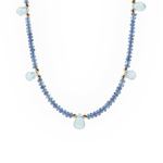 Light sapphire and blue topaz drop pendant necklace in 18K gold, showcasing elegance and handcrafted precision.