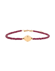 SHANGHAI ruby beaded bracelet with 18K gold center bead, adjustable 6"–7", handcrafted elegance and style.