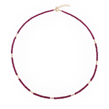 SHANGHAI Ruby Floral Tube Beaded Necklace featuring deep ruby beads and polished 18K gold accents, adjustable length.