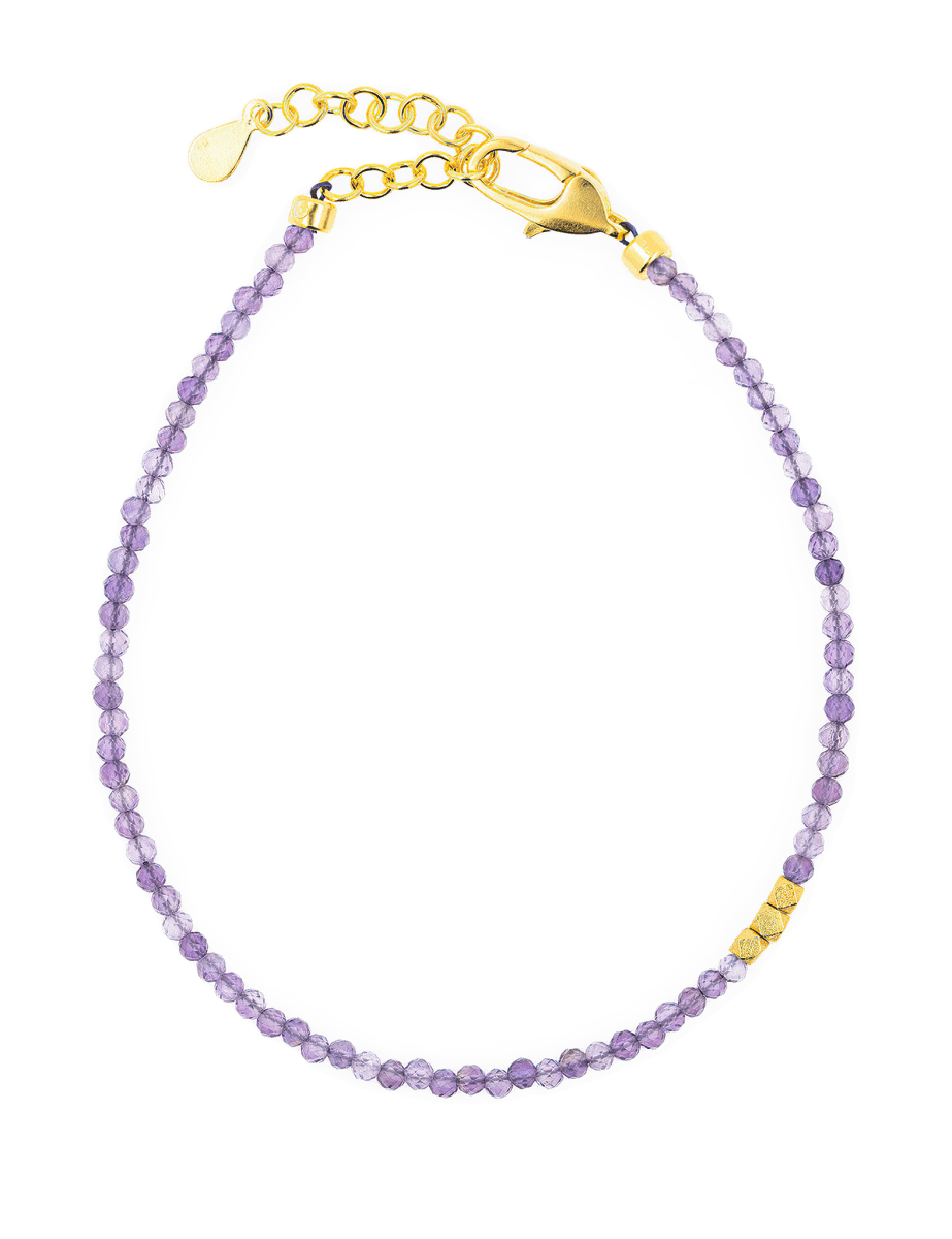 Dainty Amethyst bracelet with gold clasp and elegant design for spiritual growth and meditation.