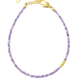 Dainty Amethyst bracelet with gold clasp and elegant design for spiritual growth and meditation.