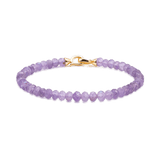 Amethyst February birthstone bracelet with faceted beads and gold clasp for spiritual growth and inner peace.
