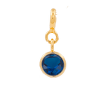 Spirituality Dark Blue Zircon Charm in gold setting, promoting spiritual growth and introspection.
